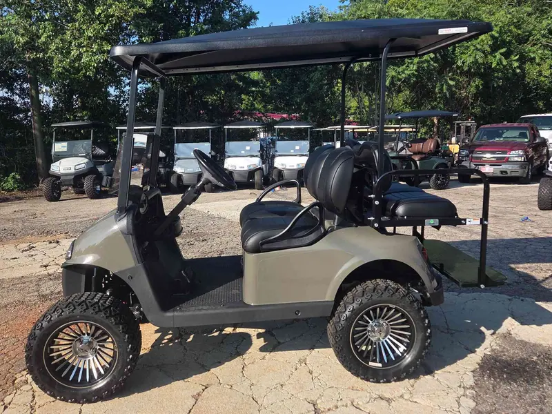 Used beige electric 2021 EZGO RXV lifted golf cart for sale in Raleigh, NC — photo 3