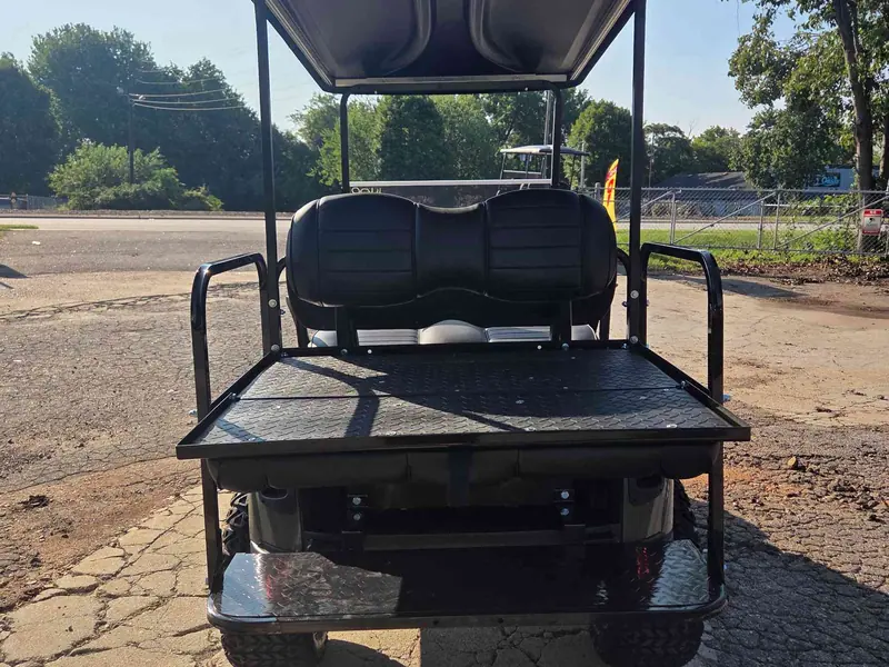 Used beige electric 2021 EZGO RXV lifted golf cart for sale in Raleigh, NC — photo 5