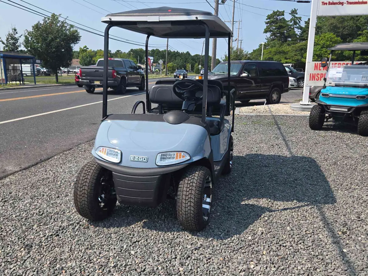 Used blue electric 2021 EZGO RXV golf cart for sale in Waretown, NJ