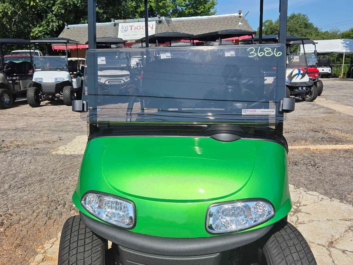 Used green electric 2021 EZGO RXV golf cart for sale in Raleigh, NC