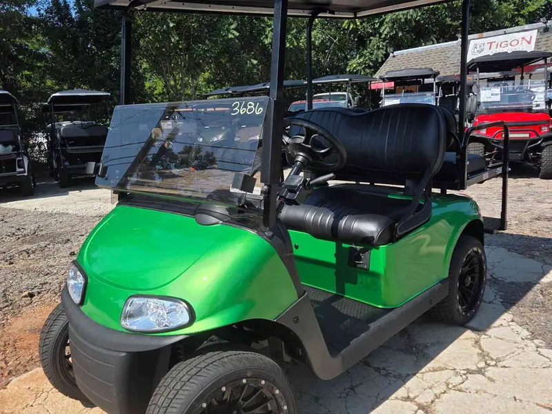 Used green electric 2021 EZGO RXV golf cart for sale in Raleigh, NC — photo 2
