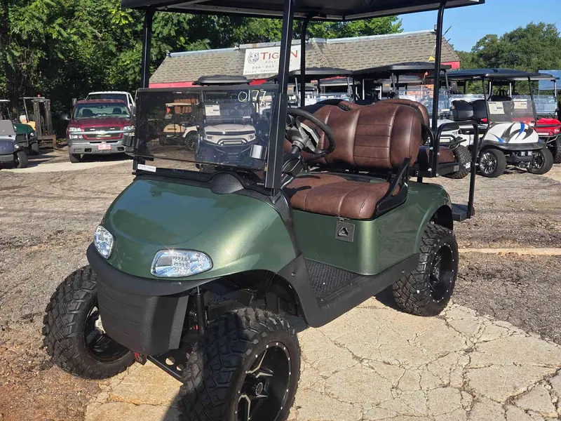 Used green electric 2021 EZGO RXV lifted golf cart for sale in Raleigh, NC — photo 2