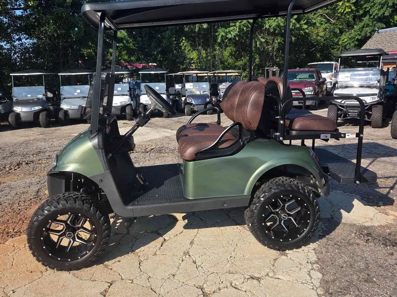 Used green electric 2021 EZGO RXV lifted golf cart for sale in Raleigh, NC — photo 3