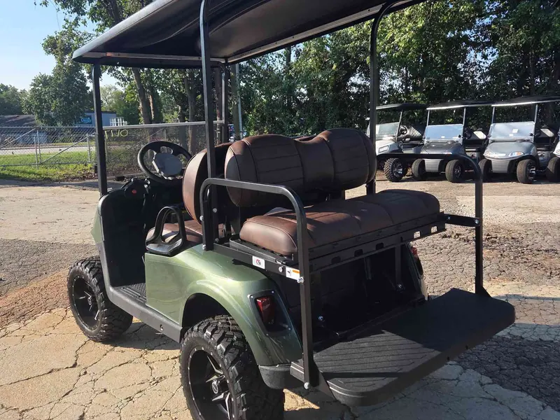 Used green electric 2021 EZGO RXV lifted golf cart for sale in Raleigh, NC — photo 4