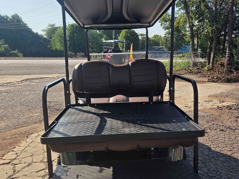 Used green electric 2021 EZGO RXV lifted golf cart for sale in Raleigh, NC — photo 5