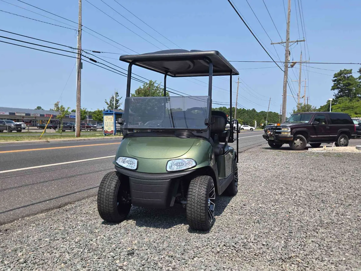 Used green electric 2021 EZGO RXV golf cart for sale in Waretown, NJ