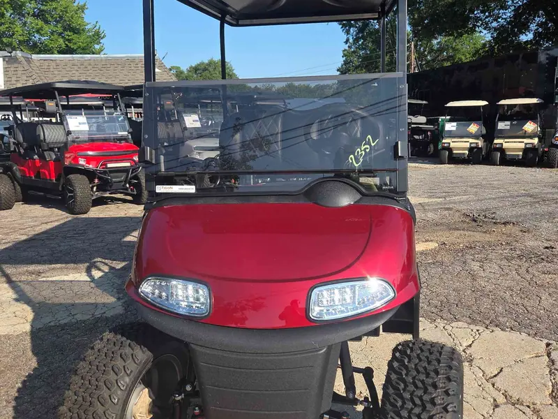Used red electric 2021 EZGO RXV lifted golf cart for sale in Raleigh, NC — photo 2
