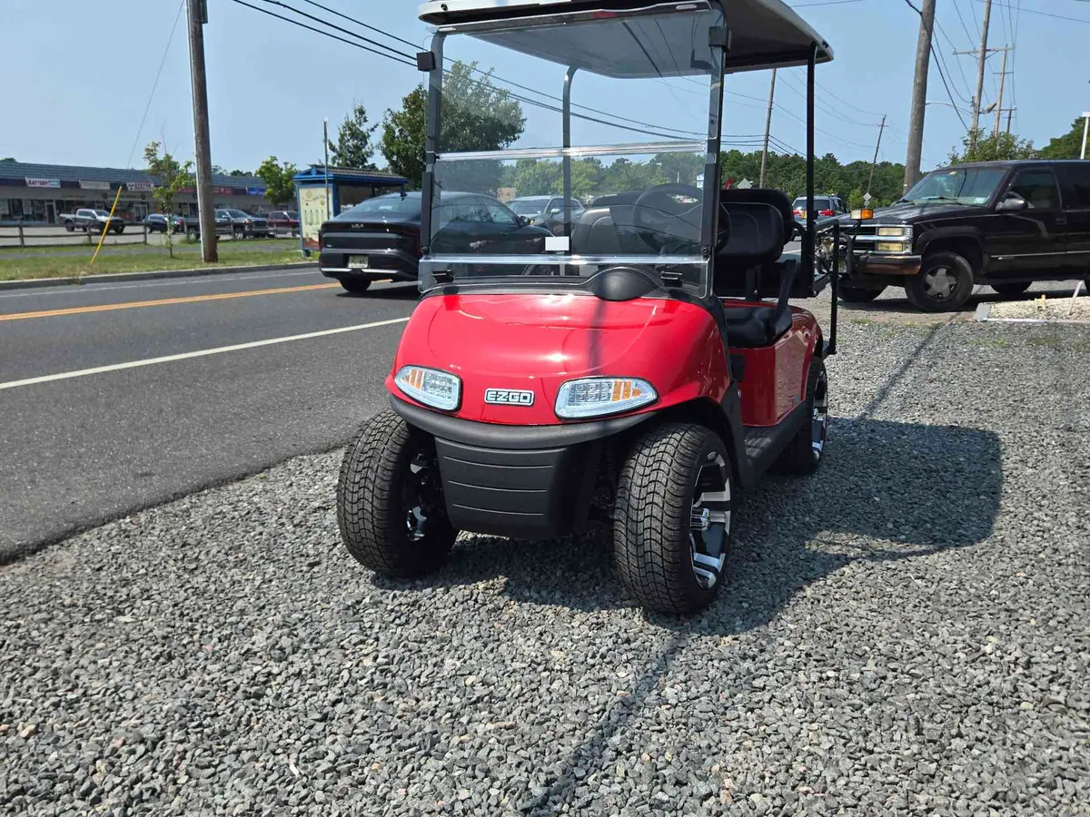 Used red electric 2021 EZGO RXV golf cart for sale in Waretown, NJ