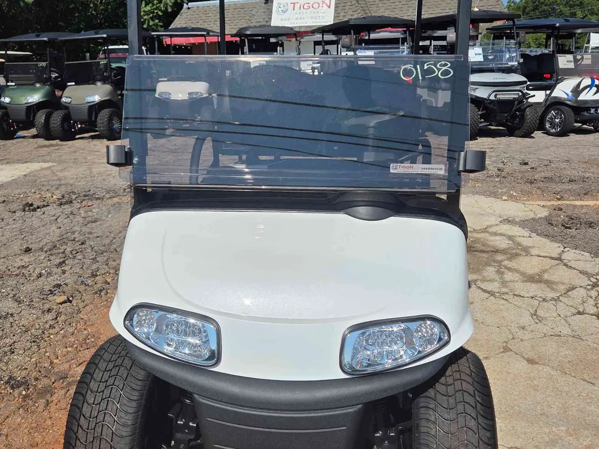 Used white electric 2021 EZGO RXV golf cart for sale in Raleigh, NC