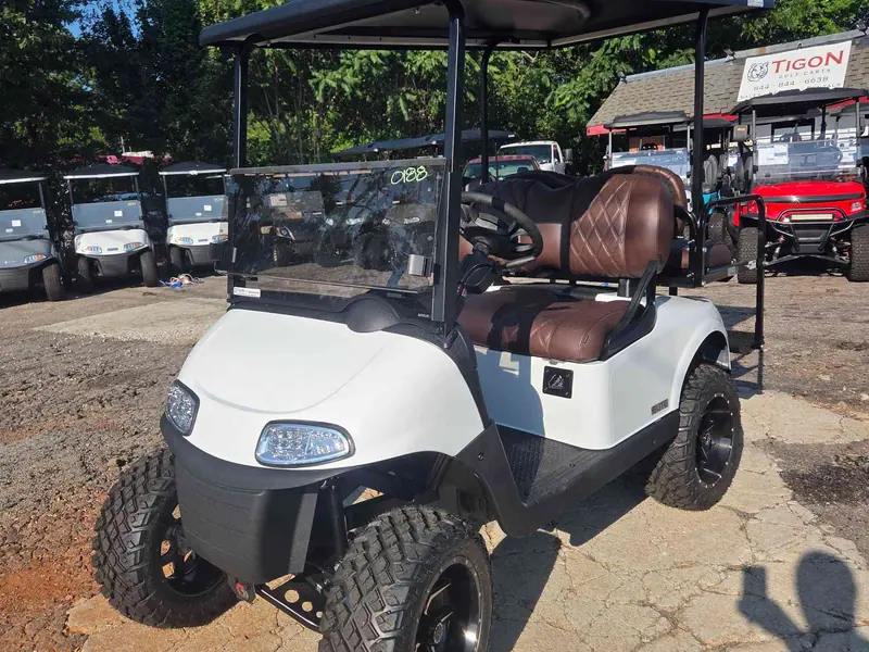Used white electric 2021 EZGO RXV lifted golf cart for sale in Raleigh, NC — photo 2