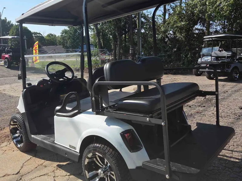 Used white electric 2021 EZGO RXV golf cart for sale in Raleigh, NC — photo 4